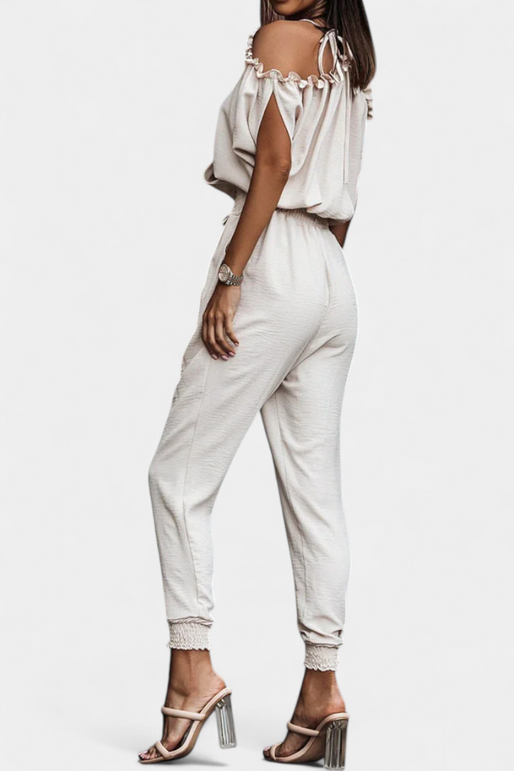 Solene Off-Shoulder Jumpsuit with Crossed V-Neck and Knotted Detail