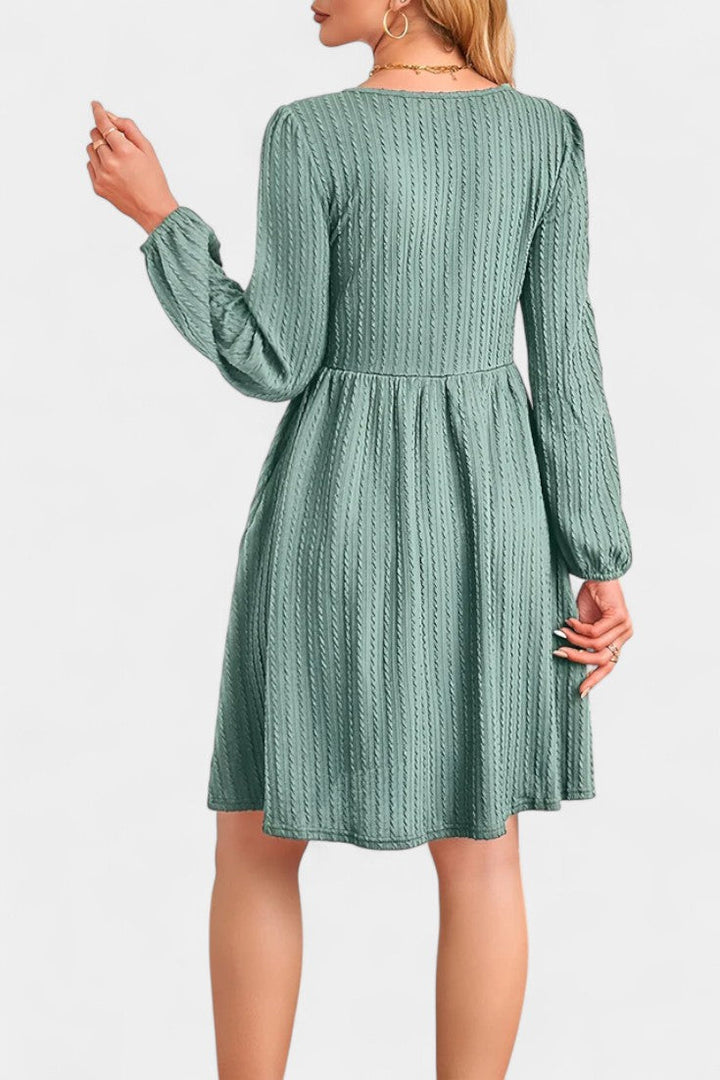 Dorothée Textured Flared Dress featuring Round Neck and Long Sleeves
