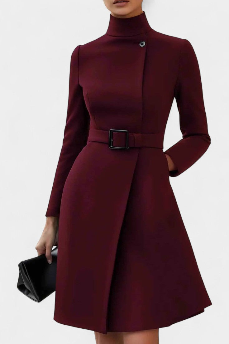 Estée Asymmetrical Black Dress Featuring a High Collar and Chic Belt