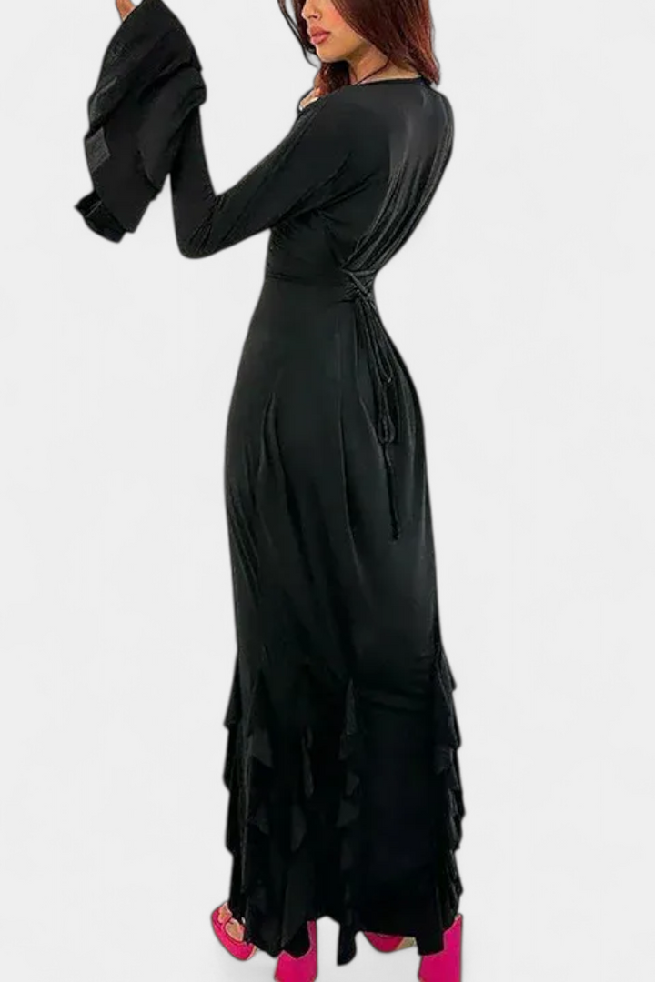Calissa Long Fitted Dress Featuring Flared Sleeves and Flowing Ruffles
