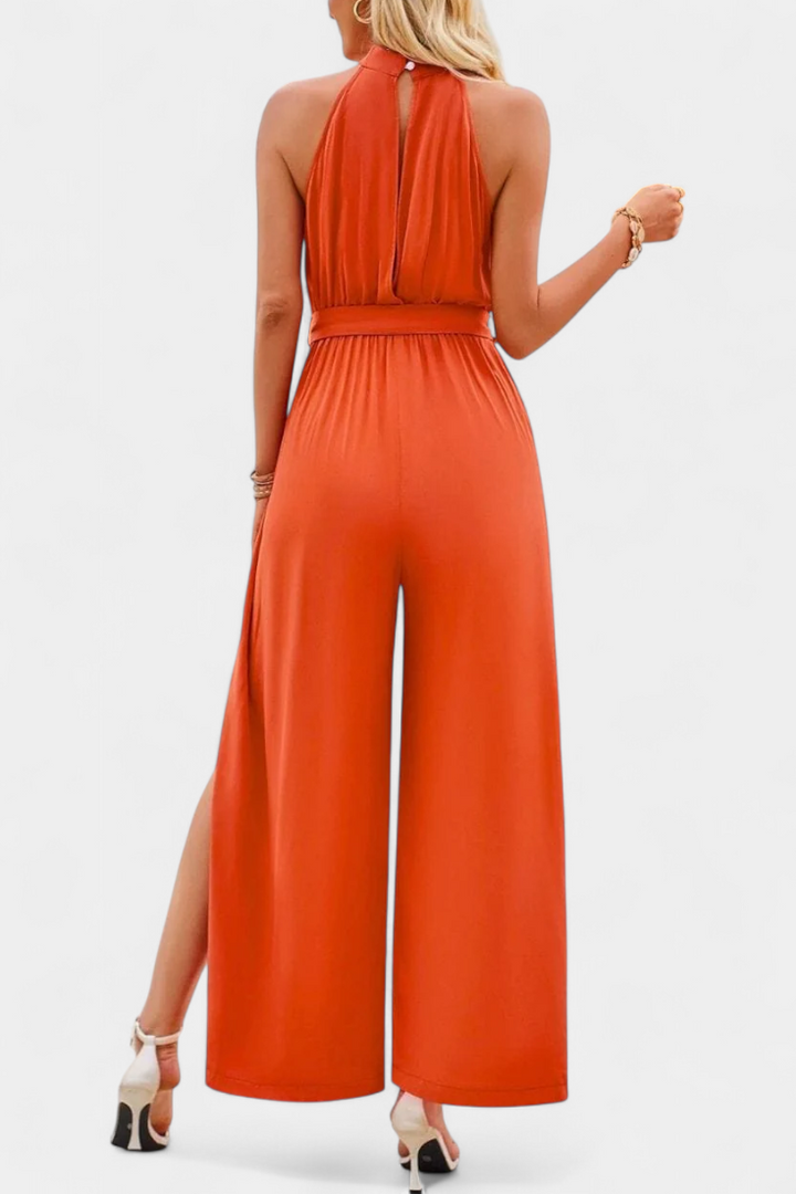 Asymmetrical One-Shoulder Jumpsuit with Bow Accent by Nyree