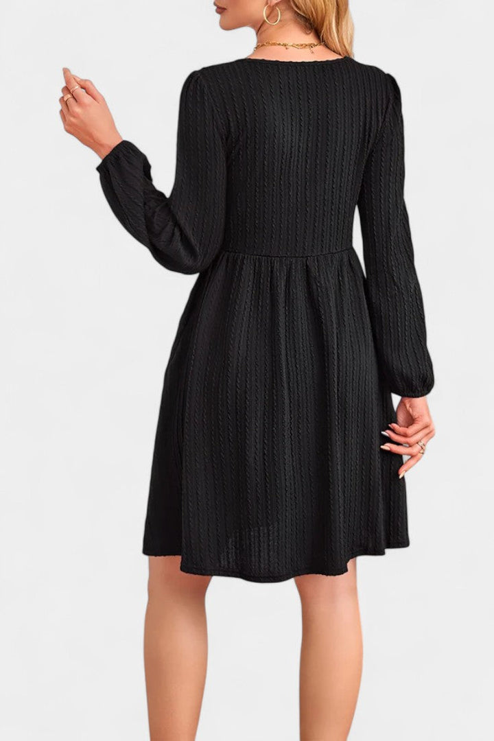 Dorothée Textured Flared Dress featuring Round Neck and Long Sleeves