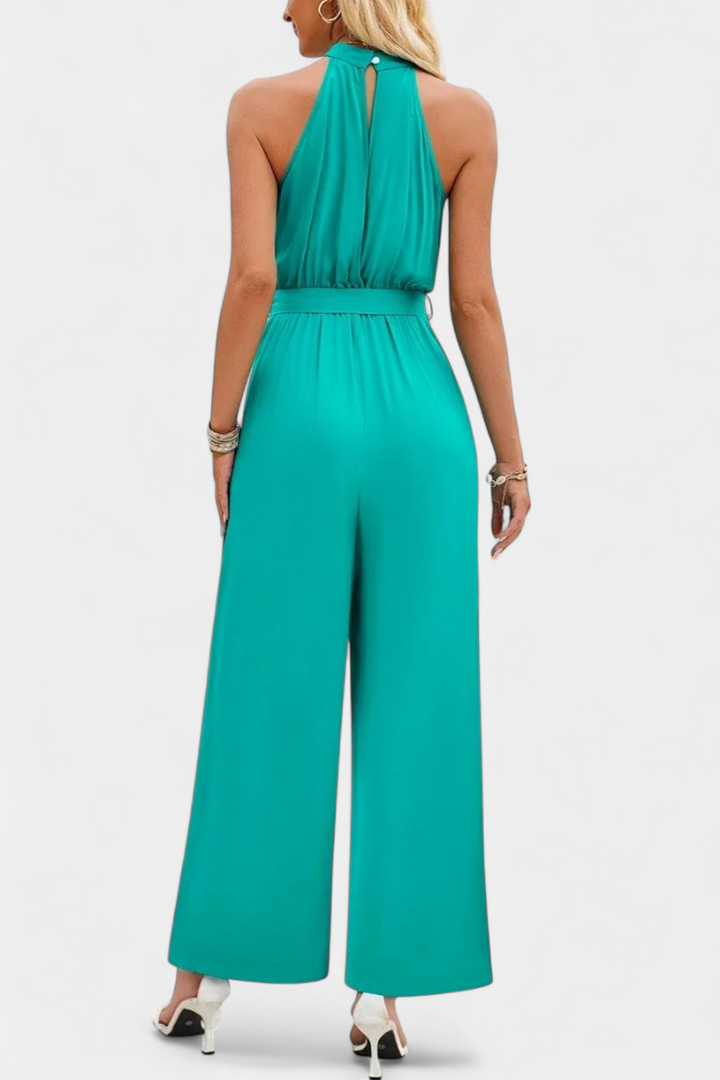 Asymmetrical One-Shoulder Jumpsuit with Bow Accent by Nyree